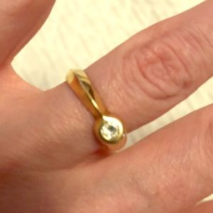14k gold ring with small diamond.